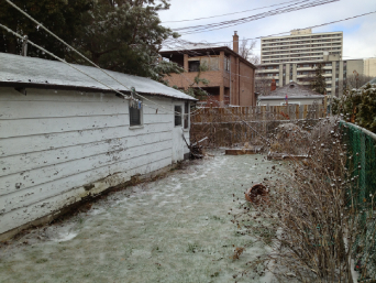 unpainted garage in March